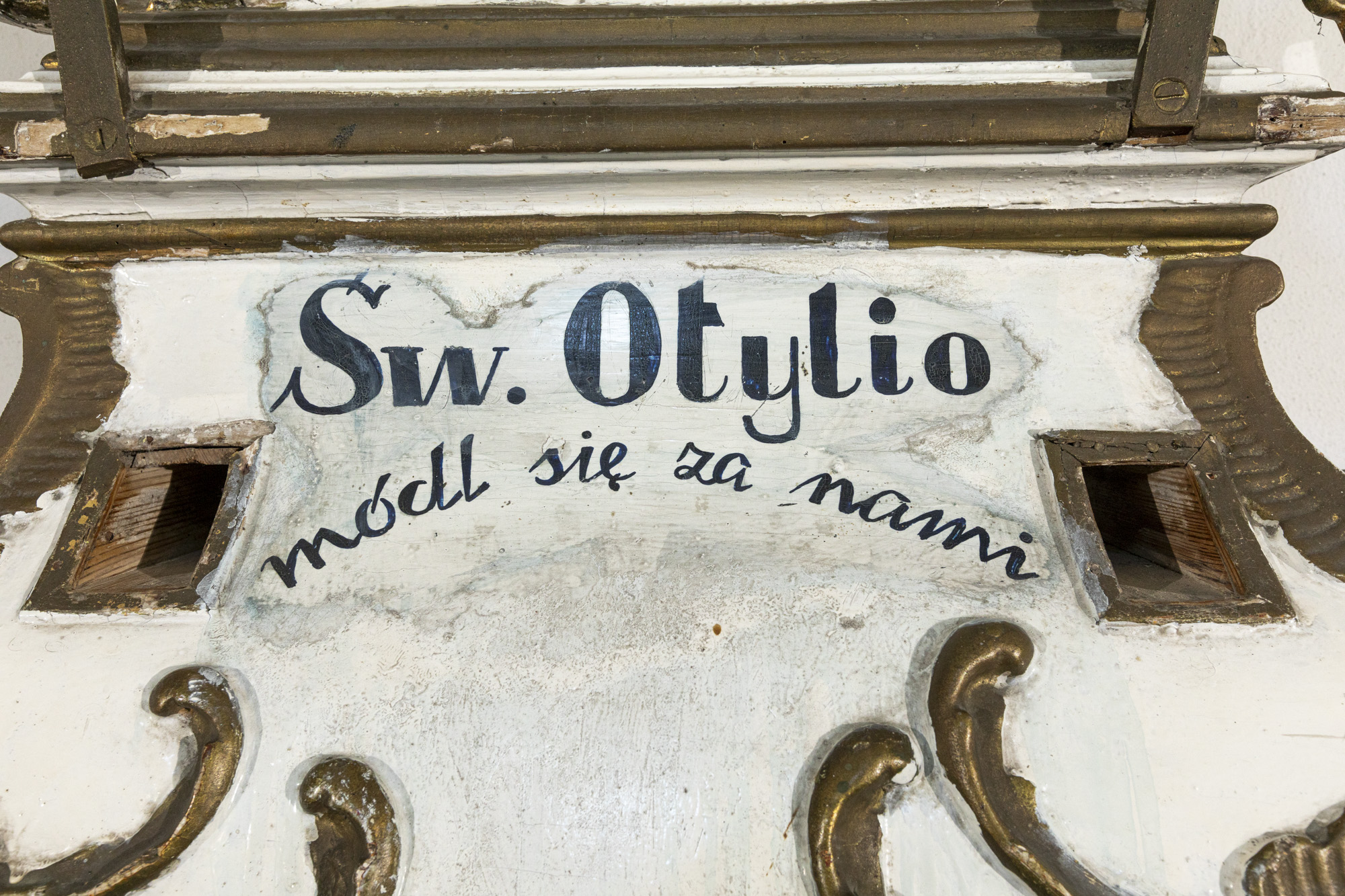 Feretron z obrazami św. Otylii i MB Niepokalanej