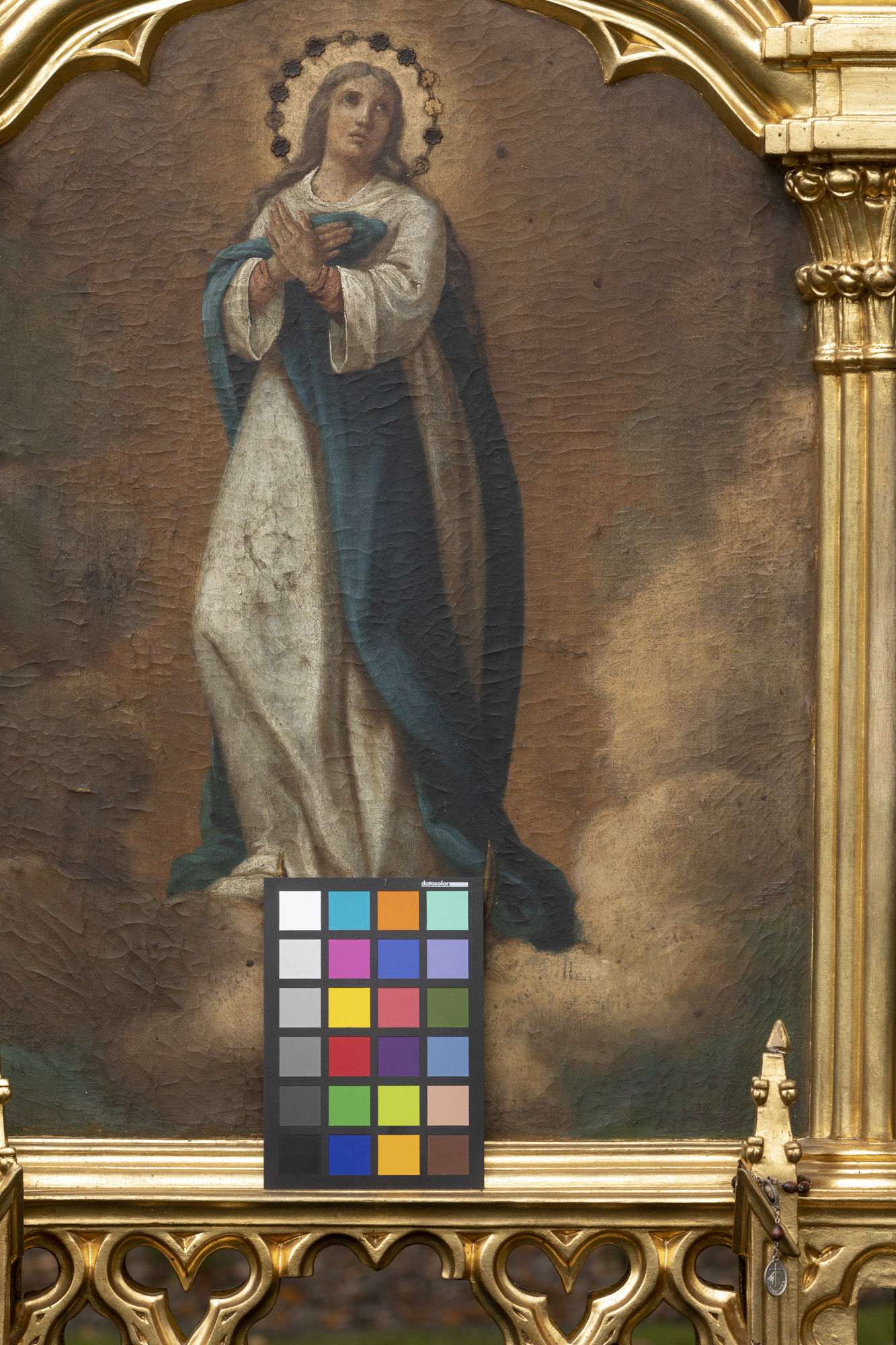 Feretron z obrazami: Matka Boska Niepokalana i św. Józef