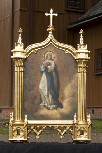 Feretron z obrazami: Matka Boska Niepokalana i św. Józef